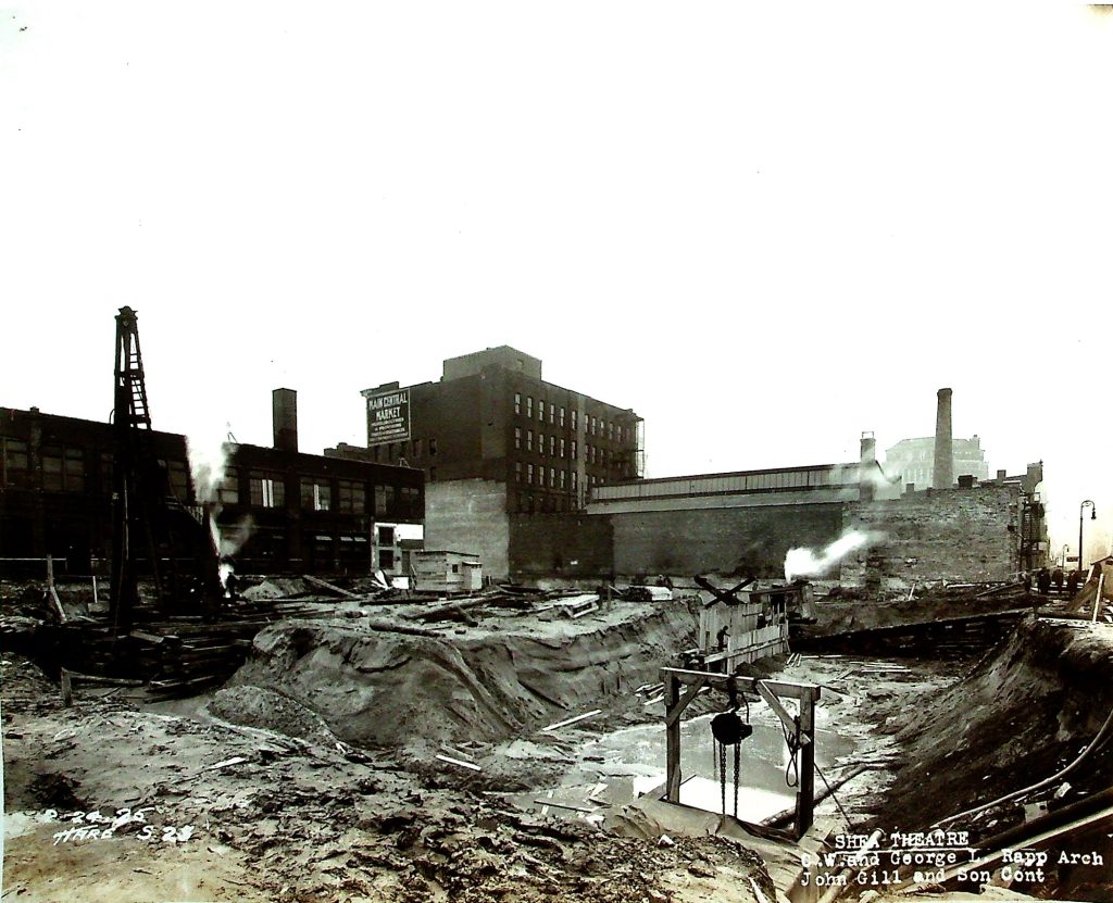 The large mound visible in this photo was intentionally left in place to support the seating in the orchestra level, ensuring a stable foundation for Shea’s grand audience area.